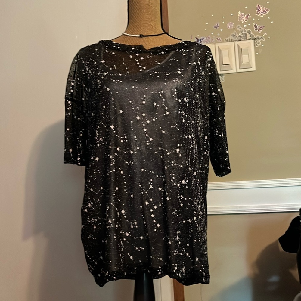 Silver undershirt with beautiful starry overshirt